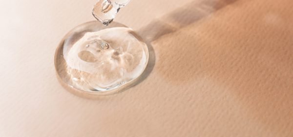 image of transparent gel being applied to the skin