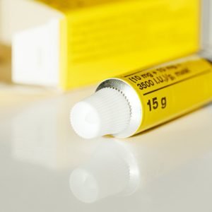 an abstract image of a medical cream tube