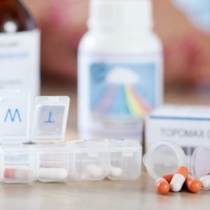 shot of medication on a kitchen table
