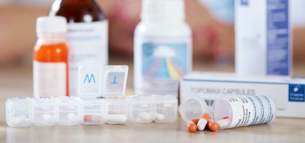 shot of medication on a kitchen table