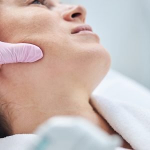 patient being examined by dermatologist