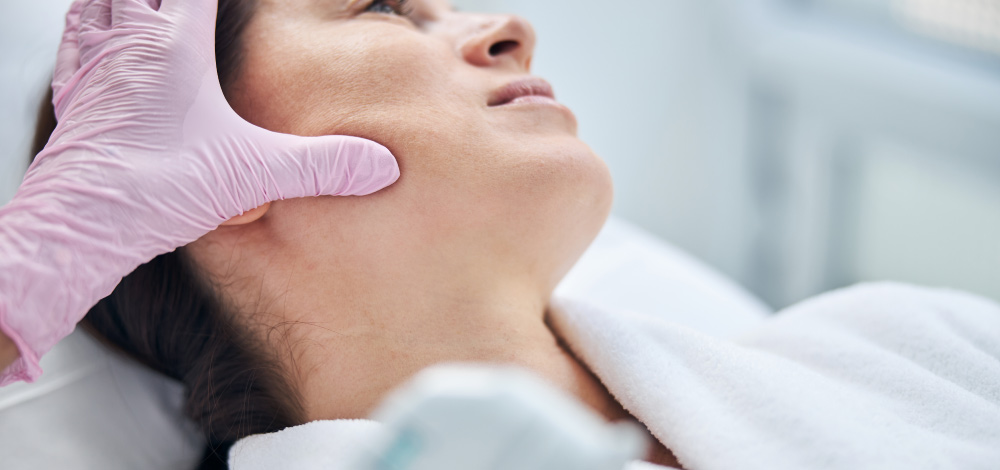 patient being examined by dermatologist
